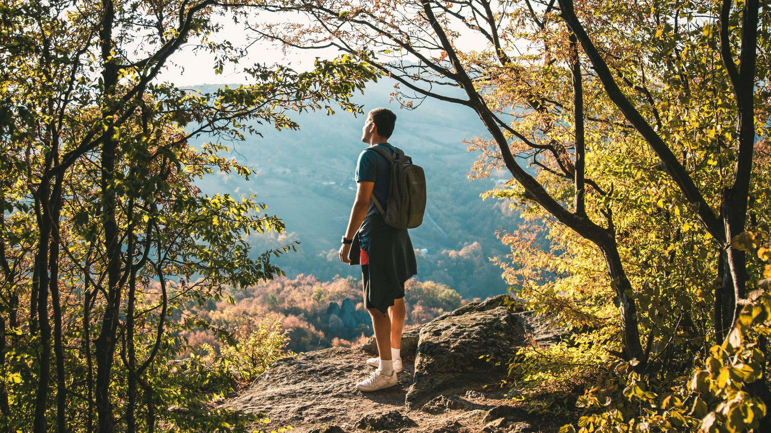 Man adventuring through nature, embodying Man Mist's mission that every man deserves to feel his best without compromising his lifestyle