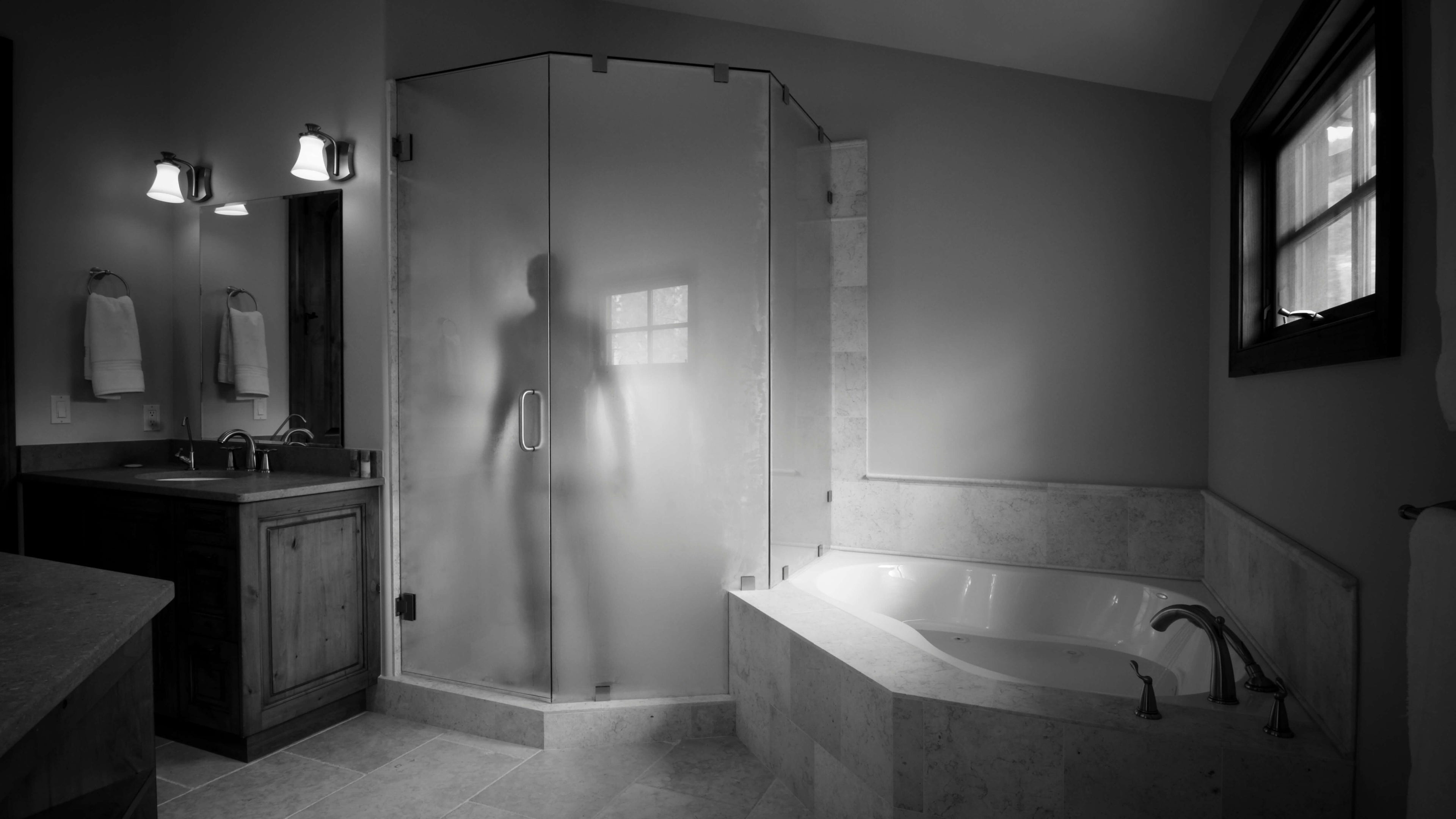 Man experiencing the future of men's aromatherapy with Man Mist essential oil shower steamer in bathroom